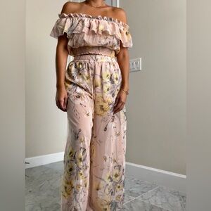 Women’s floral two piece pants and off the shoulder top outfit